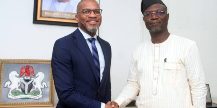 Dr. Emomotimi Agama (right), DG of SEC with CEO of InfraCredit, Mr. Chinua Azubike during a recent strategic meeting in Abuja.